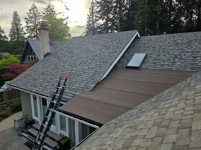 A completed residential roof replacement by Leading Edge Roofing.